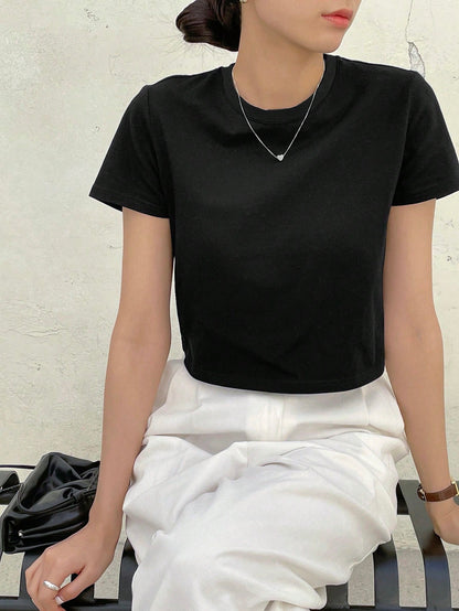 Dazy-Less Camiseta corta de cuello redondo de color sólido, tops de estilo preppy de verano, ropa casual de negocios para mujer