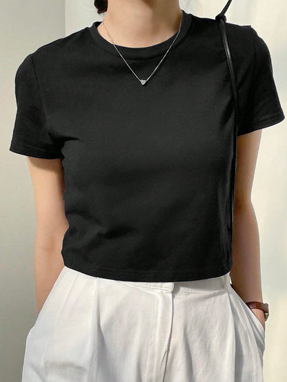 Dazy-Less Camiseta corta de cuello redondo de color sólido, tops de estilo preppy de verano, ropa casual de negocios para mujer